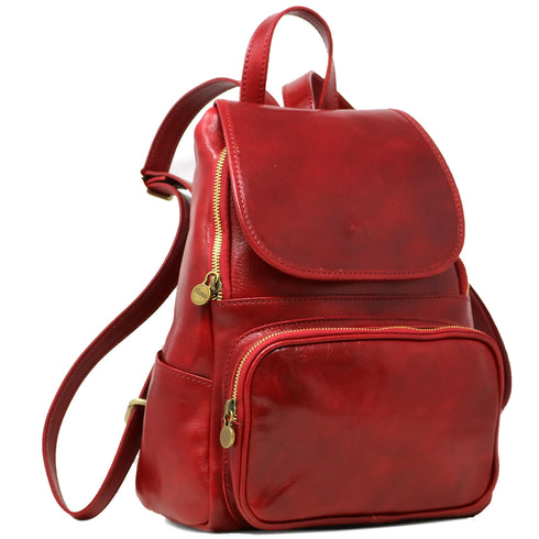 The Floto Livorno leather backpack is a wommen's fashion pack that is handcrafted in Italy. This is the Livorno Backpack in Tuscan Red. Angle view.